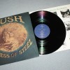 RUSH - CARESS OF STEEL (uk) - ���������